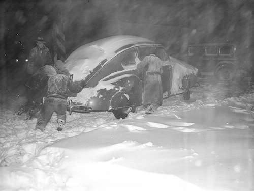 An auto stuck in the snow.