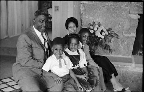 Jackie Robinson at home in Stamford with his wife Rachel, sons David, Jackie Jr.. and Sharon. 