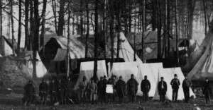 Vermont soldiers camped among pine trees in Virginia