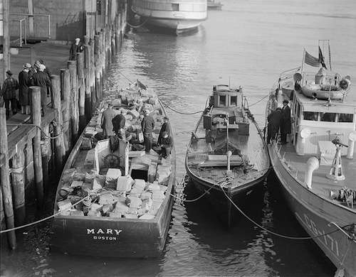 Liquor confiscated from rum runners in Dorchester Bay, 1932. Photo Courtesy Boston Public Library, Leslie Jones Collection. 
