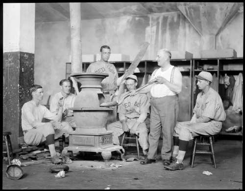 Boston Red Sox trainer Bits Bierhalter stokes up the hot stove in clubhouse at Fenway, 1928 or 1929. Photo courtesy Boston Public Library, Leslie Jones Collection. 