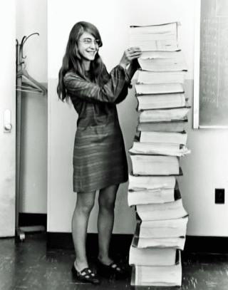 Margaret Hamilton with a printout of the code used for the Apollo 11 moon landing.