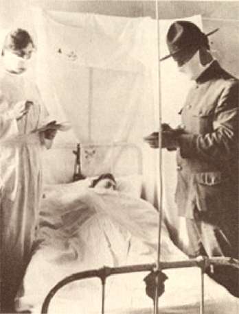 Tending a patient at Fort Devens.