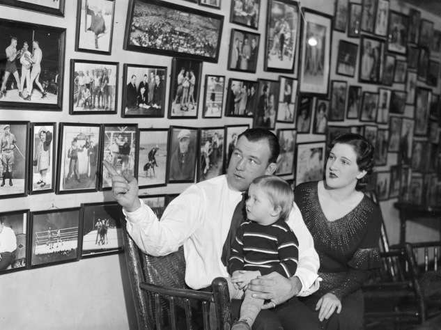 Jack Sharkey, wife and son at home, Photo courtesy Boston Public Library, Leslie Jones Collection. 