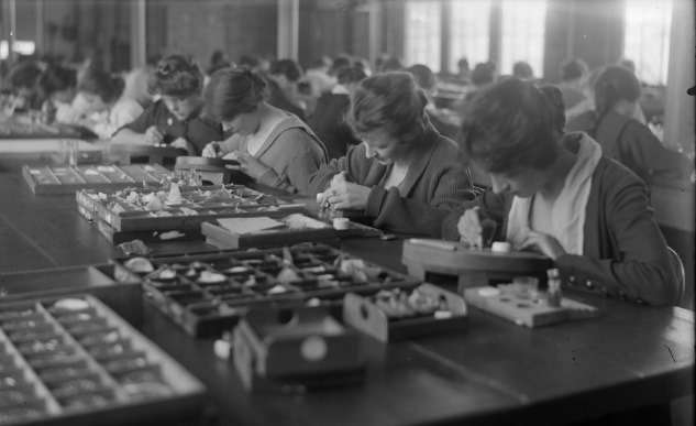 Workers making Ingersoll watches, 1900.