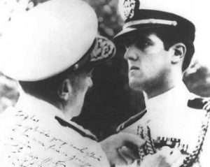 Young John Kerry receives a medal